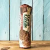 A package of Gran Cereale chocolate cookies is standing upright on a wooden surface, with a blue wooden wall in the background. Produktbild-Vorschau