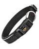 A black dog collar with a buckle and a metal ring, shown against a white background. Produktbild-Vorschau