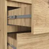Close-up view of wooden drawers with metal drawer slides. Produktbild-Vorschau