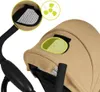 Close-up view of a stroller canopy with a mesh window and a fan icon. Produktbild-Vorschau