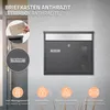 A dark gray letterbox mounted on a textured light gray wall, with inset circular images showing details and a hand inserting a letter. Icons and text describing features are at the bottom. Produktbild-Vorschau