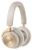 A pair of cream and gold over-ear headphones. Náhľad obrázku produktu