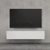 A modern TV mounted on a concrete wall above a floating white cabinet. Produktbild-Vorschau