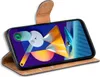 A book-style phone case with a Samsung Galaxy M11 phone inside, displayed at an angle. Náhled obrázku produktu