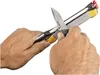 Hands sharpening a knife with a sharpening tool. Produktbild-Vorschau