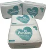 Several packages of Pampers Harmonie diapers are stacked and arranged. Podgląd zdjęcia produktu