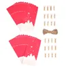 A set of red paper bags with white snowflake and snowdrift designs, along with wooden clothespins and a spool of twine, arranged on a white background. Produktbild-Vorschau