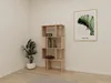 A modern living room corner with a wooden bookshelf, a potted plant, and a framed picture on the wall. Produktbild-Vorschau