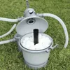 A pool filter system with filter balls sitting on grass. Anteprima dell’immagine prodotto