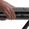 A close-up shot of a hand adjusting the cover of an ironing board. Produktbild-Vorschau