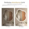 A comparison of a bathroom mirror's light settings, showing 10% and 100% brightness. Podgląd zdjęcia produktu