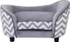 A pet sofa with a gray upholstered seat and a gray and white chevron pattern on the sides. Náhled obrázku produktu