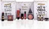 A collection of makeup and cosmetic products arranged in front of decorative advent calendar boxes. Produktbild-Vorschau