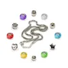A collection of jewelry beads and a necklace arranged on a white background. Produktbild-Vorschau