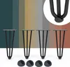 Four black hairpin legs are displayed on a white surface against a background of vertical color stripes. A close-up inset shows the detail of one leg's base. Náhľad obrázku produktu