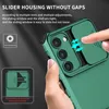 A hand is shown sliding a camera cover on a green phone case. Produktbild-Vorschau