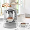 A Turkish coffee machine is shown in a kitchen setting, with two cups of coffee. Produktbild-Vorschau
