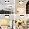 Collage of four images showing a black and white LED ceiling light in different home settings: a kitchen, a hallway, a bedroom, and a living room. Produktbild-Vorschau