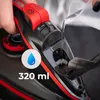A person is pouring water into a cordless steam iron. Anteprima dell’immagine prodotto
