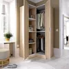 A corner wardrobe with open doors, showing clothes and storage shelves, in a room with a window and a stool. Produktbild-Vorschau