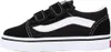 A side view of a black and white Vans Old Skool V sneaker for children. Voir les images du produit