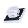 The back of a white digital thermostat is shown, mounted on a black base, against a white background. Náhľad obrázku produktu