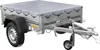 A small trailer with a gray cover is shown against a white background. Podgląd zdjęcia produktu