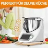 A woman in a kitchen is preparing food with a Thermomix appliance. Vegetables are visible in the foreground. Voir les images du produit
