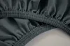 A close-up view of the elasticized hem of a fitted sheet. Produktbild-Vorschau