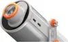 Close-up view of a white and orange portable projector, highlighting its lens and speaker grille. Produktbild-Vorschau