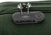 Close-up of a luggage combination lock on a green suitcase. Náhled obrázku produktu