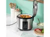A digital rice cooker and steamer filled with vegetables is shown on a kitchen counter. Produktbild-Vorschau