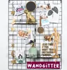 A black wire grid display board decorated with various items like photos, ornaments, and a small watering can. Produktbild-Vorschau