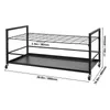 A black metal rolling storage rack with two shelves and a flat bottom tray. Náhled obrázku produktu