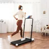 A woman is running on a treadmill in a home environment. Anteprima dell’immagine prodotto