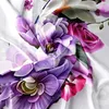 A close-up, artistic depiction of a floral pattern on fabric, likely a duvet cover. Produktbild-Vorschau