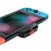 A close-up shot of a Nintendo Switch with a Bluetooth audio adapter attached to the bottom. Podgląd zdjęcia produktu