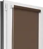A close-up view of a brown roller blind installed on a white window frame. Produktbild-Vorschau