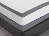 A close-up view of a mattress topper on a bed base. Náhled obrázku produktu