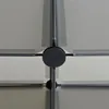 Close-up view of a modular shelving system with rulers on the bars. Produktbild-Vorschau