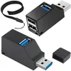 Two black USB hubs are shown against a white background. One hub is a compact, rectangular design with three USB ports and a USB-A connector. The other hub is a more angled design with one USB port and a USB-A connector, and a detached cap is visible next  Anteprima dell’immagine prodotto