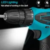 Close-up of a cordless drill with its LED light on, highlighting its functionality in dark environments. Produktbild-Vorschau