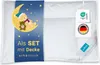 A white pillow with a blue marketing band featuring a teddy bear on the moon and text. There are also certification tags attached. Produktbild-Vorschau