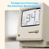 A close-up of a retro-style digital alarm clock designed to resemble an old computer. Produktbild-Vorschau