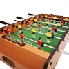 A close-up, slightly angled view of a mini foosball table. Náhled obrázku produktu
