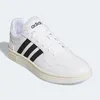 A white Adidas sneaker with black stripes and a cream sole, shown from a slightly elevated side angle against a white background. Anteprima dell’immagine prodotto