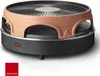 A studio shot of a tabletop pizza oven and raclette grill. Podgląd zdjęcia produktu