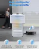 A woman walks in the background while a smartphone displays a cleaning app interface, with a robot vacuum cleaner in the foreground. Produktbild-Vorschau