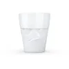 A white ceramic mug with a grumpy face design. Náhľad obrázku produktu