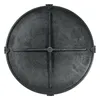 A top-down view of a black, circular manhole cover with a cross-shaped reinforcement pattern. Podgląd zdjęcia produktu